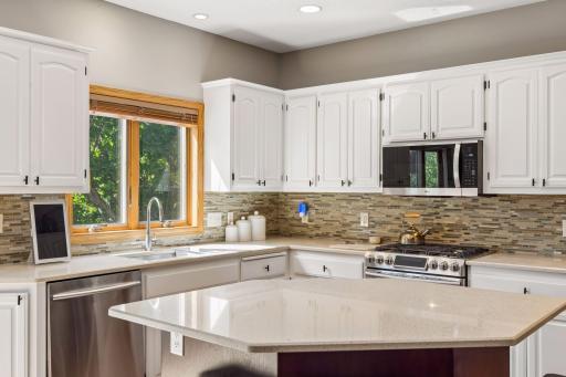 So much counter space. The island is a perfect surface for making cookies, or helping the cook.