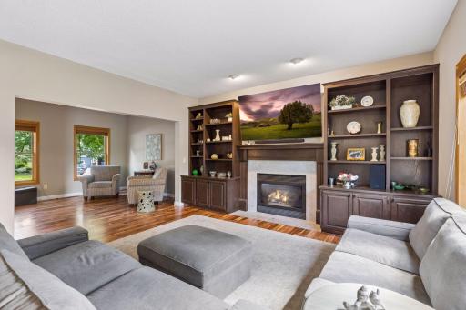 Main level is spacious and has multiple uses. Hang out in the kitchen, or watch a movie in the family room, or choose to relax with a book in the living room.