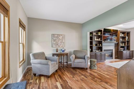 Living room off the foyer with windows overlooking the front yard. The Acacia hardwood floors are gorgeous and warm.