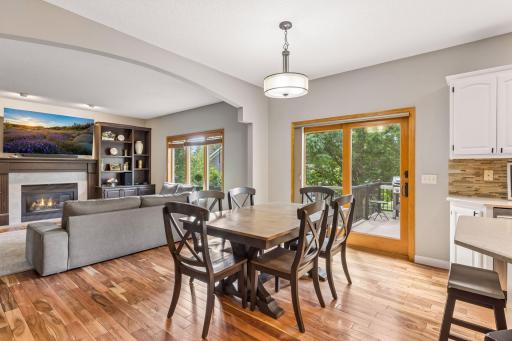 Dining room table for 6, but the space is large enough to have an expanding table. The arch and architectural details offer character in the home.
