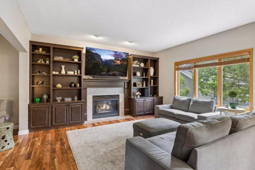 Extra large family room is perfect for family time and for entertaining. Enjoy all the natural light through updated Andersen Windows.