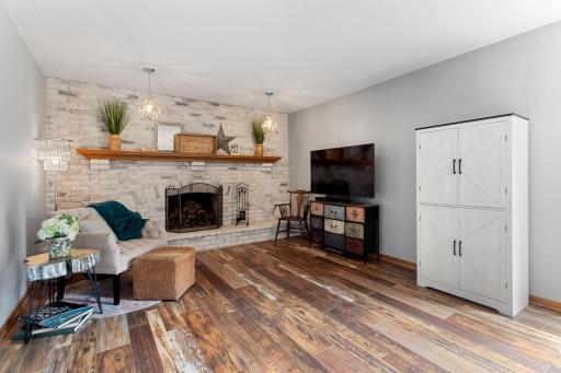 06 Family room with wood-burning fireplace.jpg