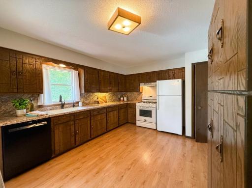 Kitchen provides Abundant Countertop and Cabinet Space! AI-Enhanced & Staged