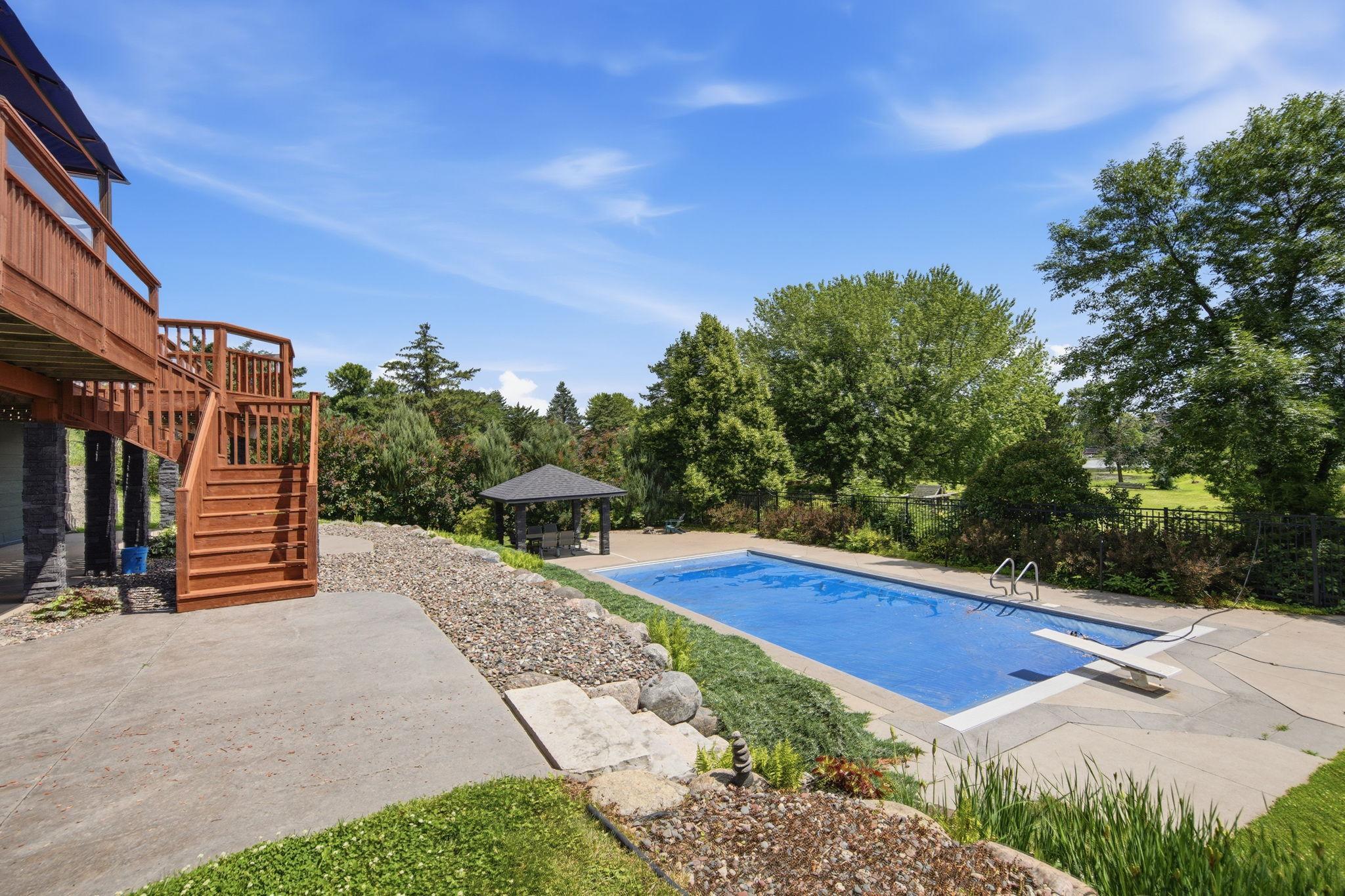 20x40 pool with 35,000 gallons. Pool is also 9 feet in the deep end. Electric cover is included. New pool pump, new pool liner. Pool has been staged to remove the cover.