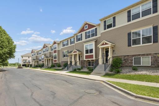 Impressive 3-level townhome in an unbeatable Maple Grove location, offering exceptional walkability to Arbor Lakes, the community center, library, and a variety of restaurants and shops.