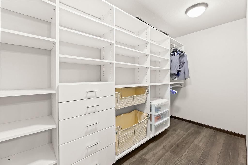Bedroom 4 of 5 walk in closet w/ built ins