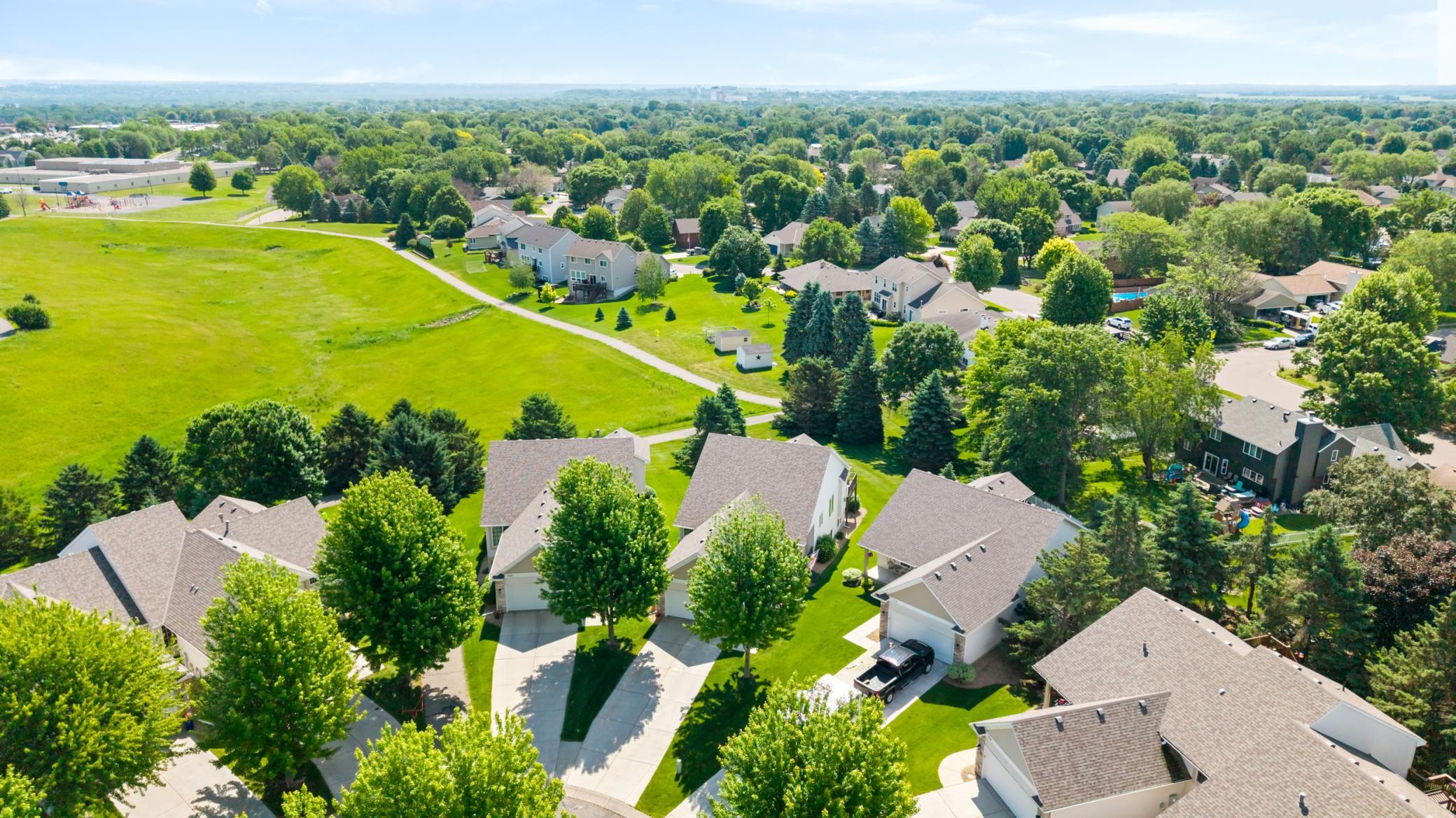 Check Map Views to See its Proximity to Green Spaces and Trails, Plus it's Walking Distance to Major Retail Stores. But with the Distance from Busier Roads, You'll Find "You're Near it But You Can't Hear it!"