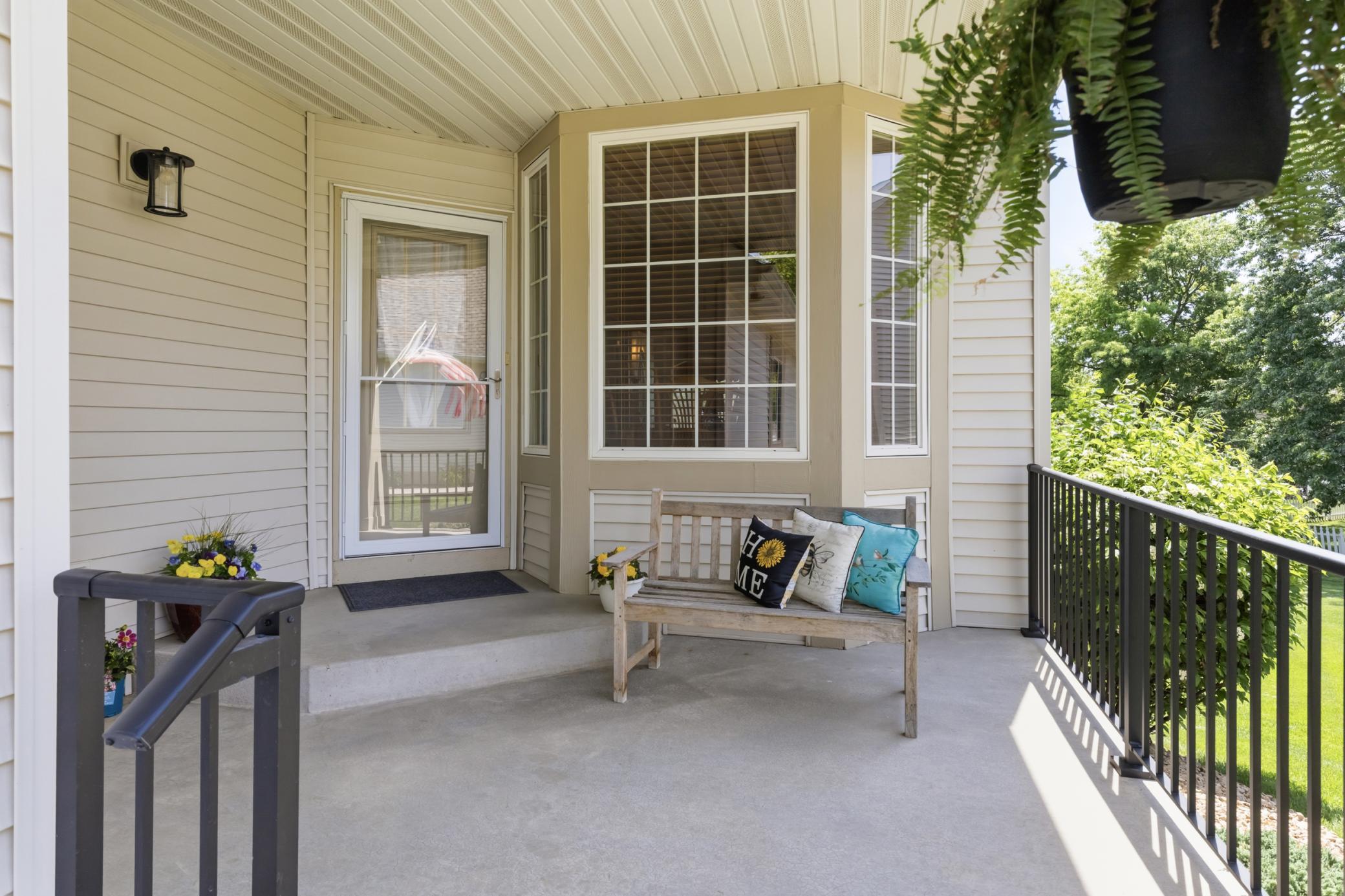 Welcoming Shaded Front Porch and Main Entry.