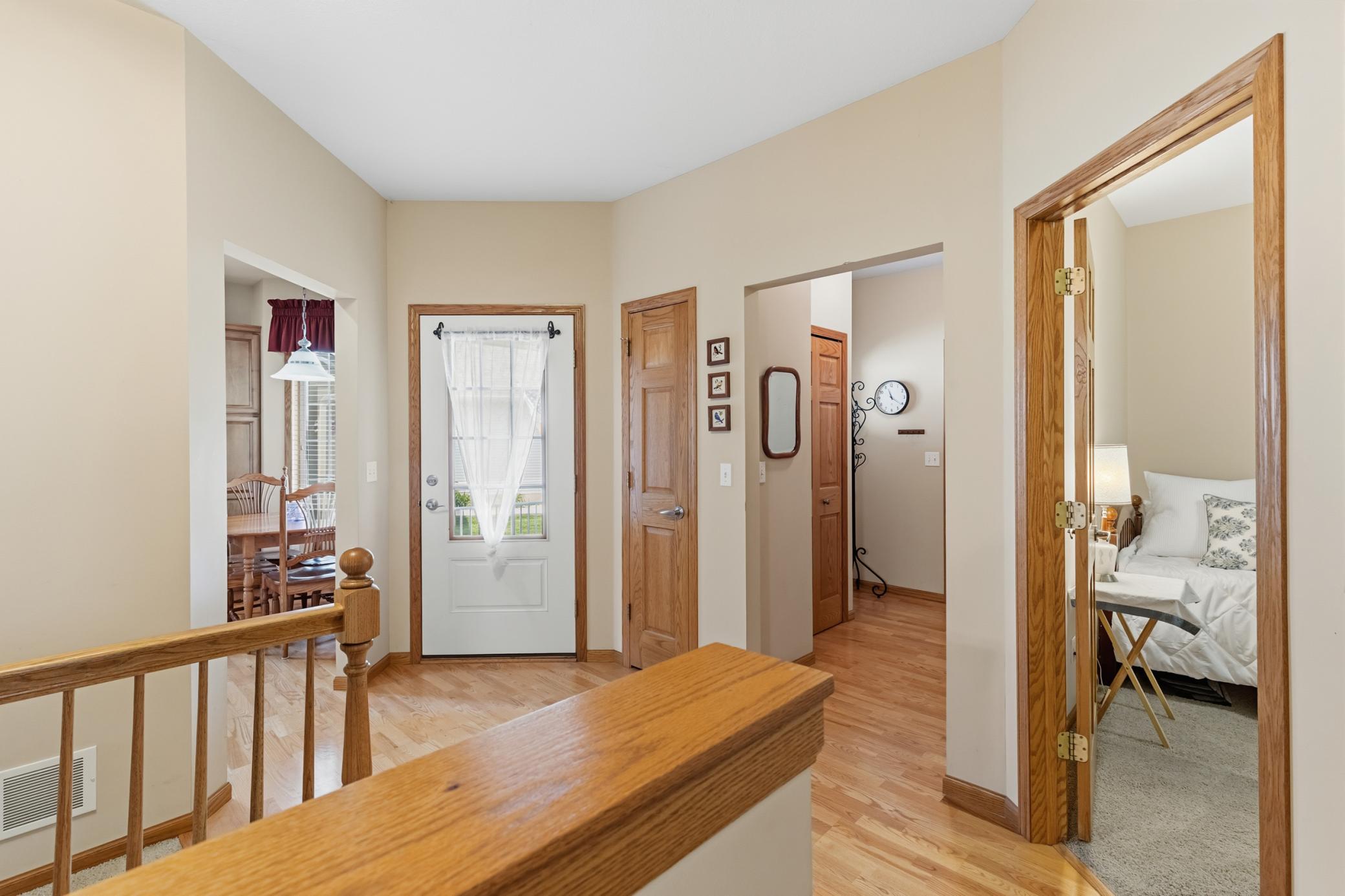 This View Shows the Way to the Kitchen, the Main Entrance with Coat Closet, the Garage Coat Room Entrance with an Even Bigger Closet and Bedroom 2. The Laundry Room and a Full Bath are also at Right.