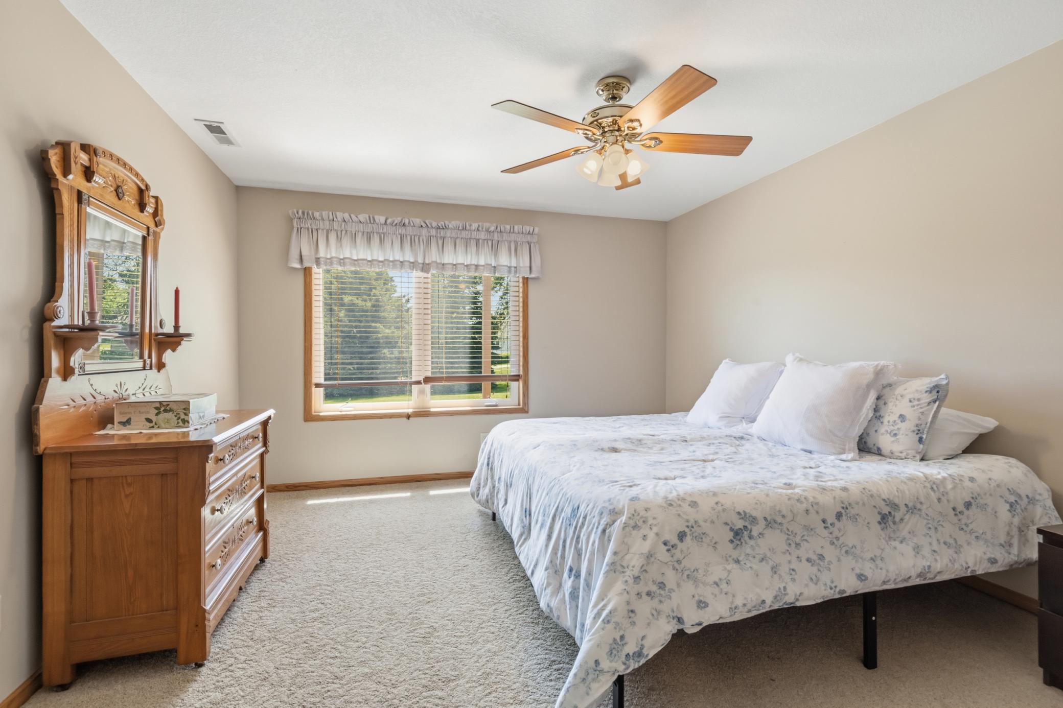 Back Inside also Find Bedroom 3 in the Lower Level, with a Lookout Window to Enjoy Views of the Pines and the Back Yard...not the Walls of a Window Well or Neighbors.