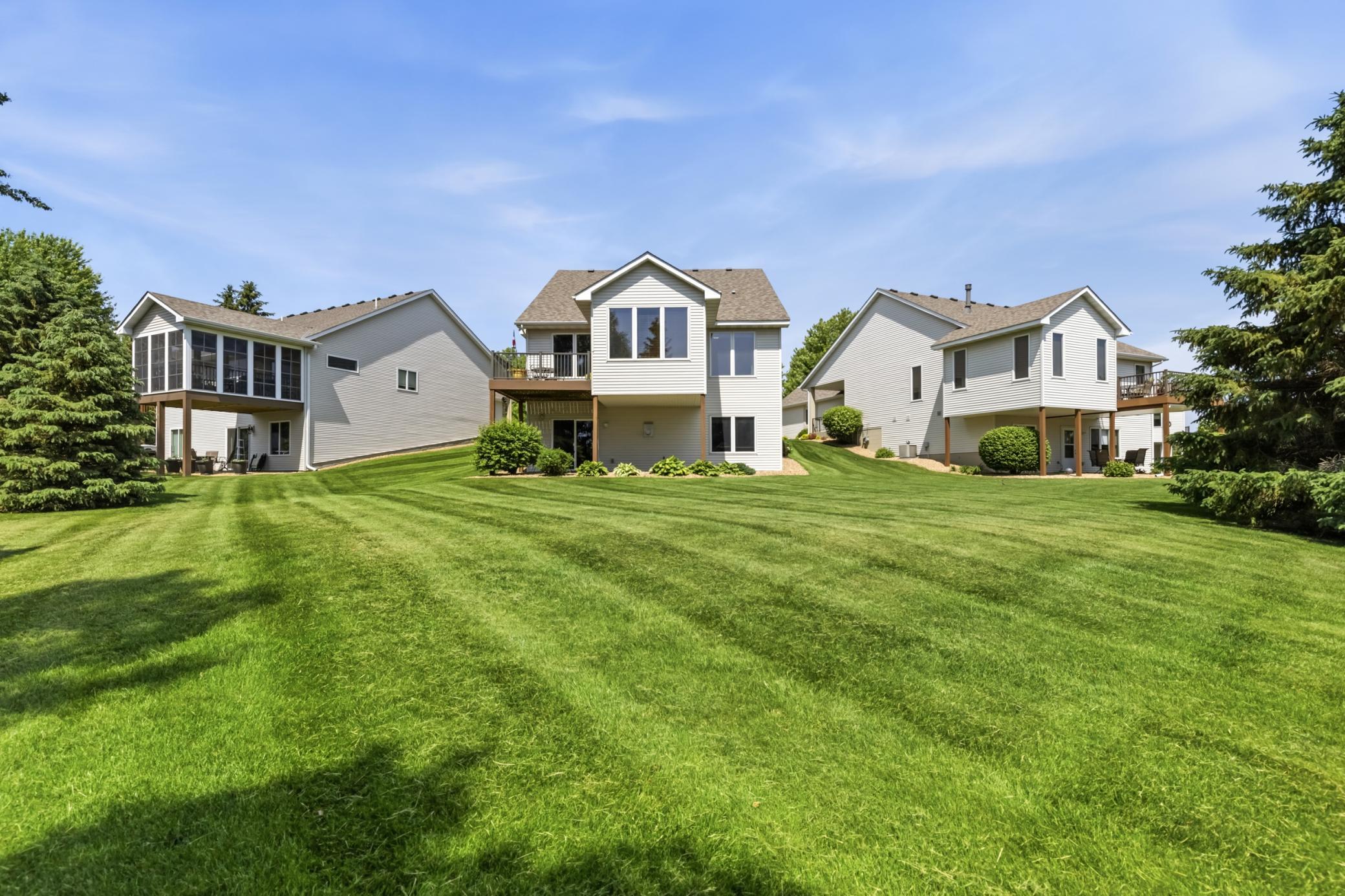The Front, Side and Back Yards are Watered by Inground Sprinklers and Maintained Weekly by the Grounds Crew.