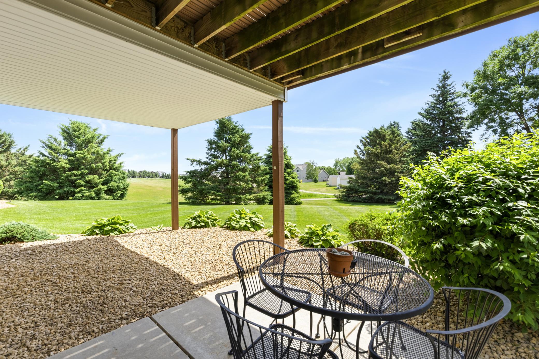 From Here Step Out to the 10x10-ft Concrete Patio, the Vast Lawn and Green Space and Trails. Another Distinctive Living Space Where You Can Relax in the Shade or Begin Walking the Dog on the Trails That Lead to Christa McAuliffe Elementary School.