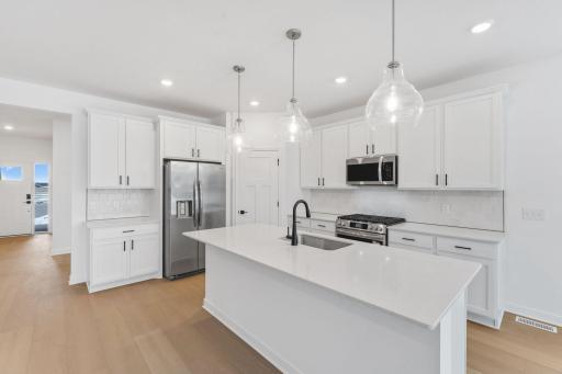 (Photo of a similar home, actual finishes may vary)