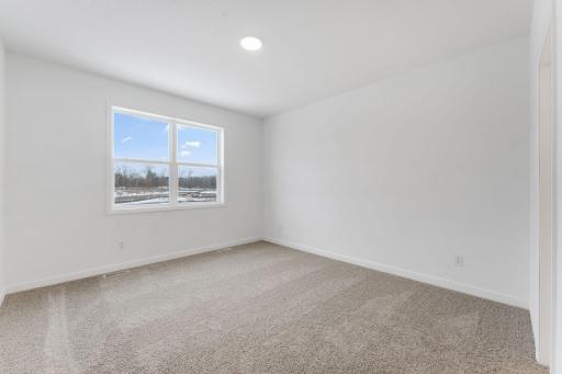 (Photo of a similar home, actual finishes may vary)