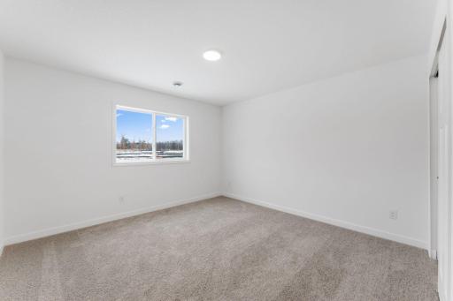 (Photo of a similar home, actual finishes may vary)