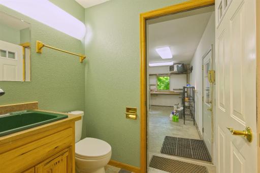 double doors allow bathroom entrance from garage with privacy