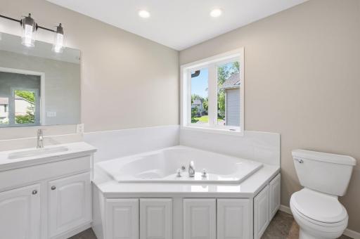 Relaxing tub perfect to enjoy with a book and glass of wine