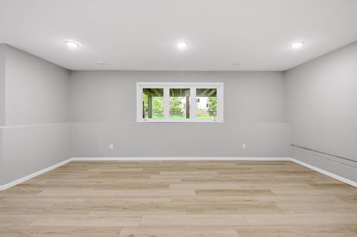 Large lookout windows provides lots of natural light in the basement