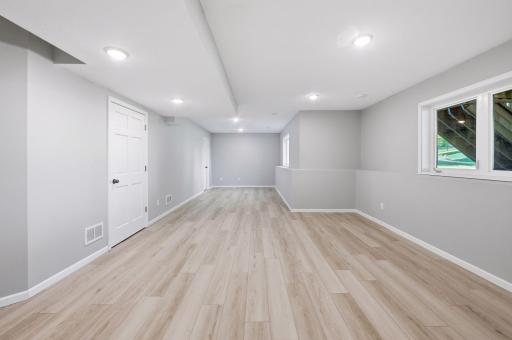Enjoy an expansive downstairs rec area perfect for a gym or play area for the kids