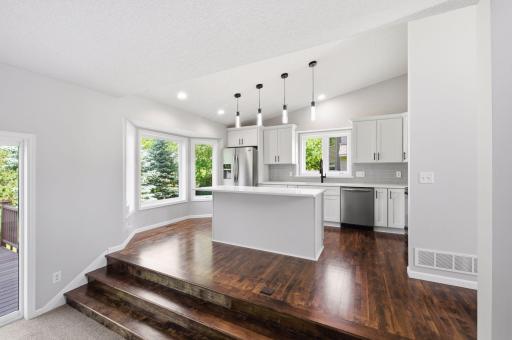 Enjoy easy access to the kitchen with elegant maple hardwood steps