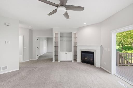 The living room leads into the main floor bedroom that can also be used as an office.