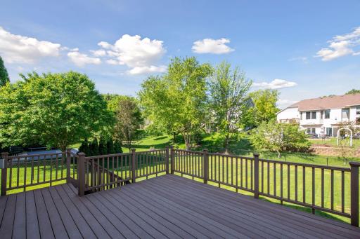 Relax in the quiet backyard on the maintenance free trex deck