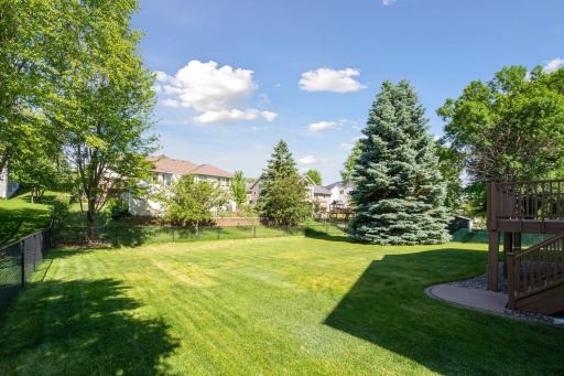 Custom improvements like concrete curbing around the entire yard show the pride of ownership