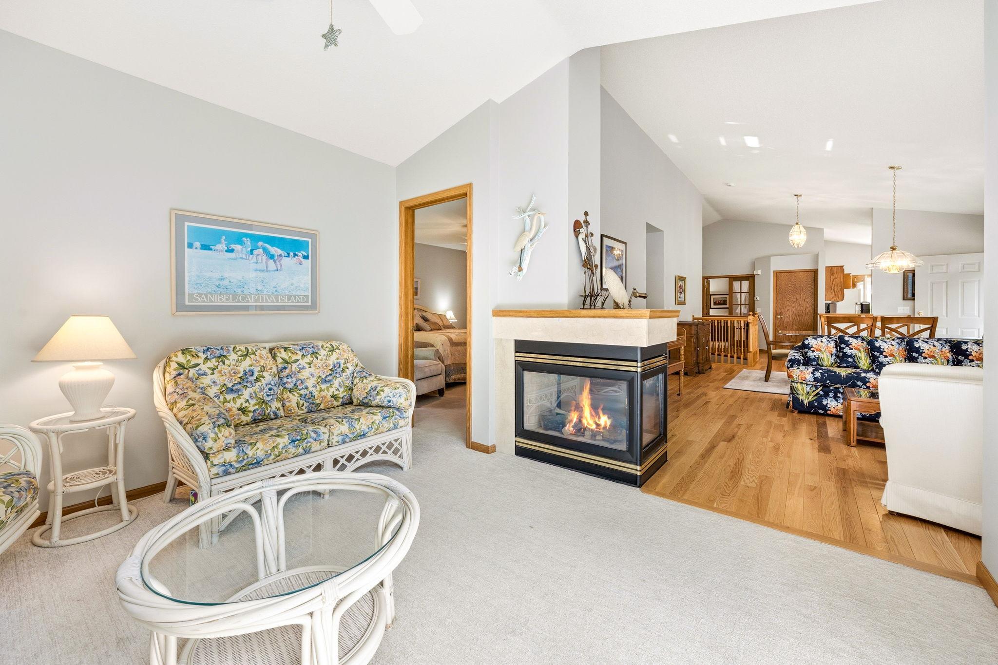 Sunroom shares 3 sided Fireplace
