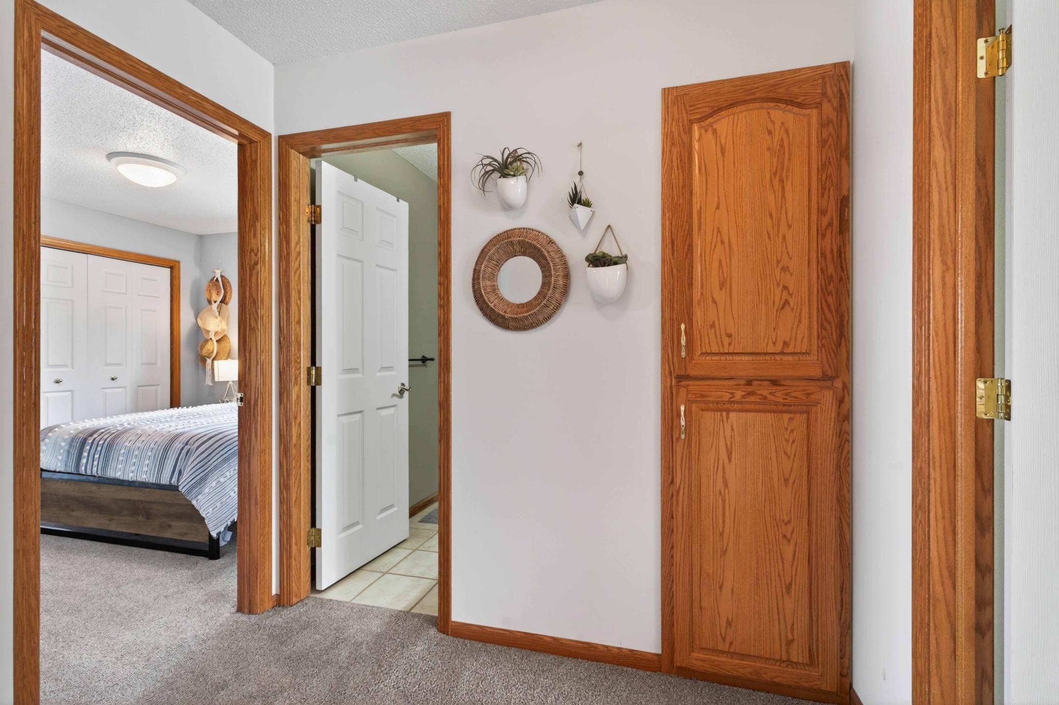 HALLWAY TO BEDROOMS AND BATHROOM