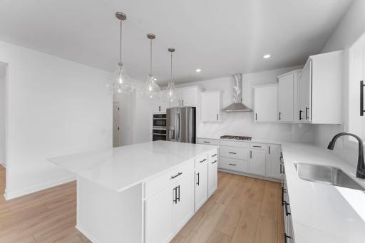 (Photo of a similar home, actual finishes may vary)