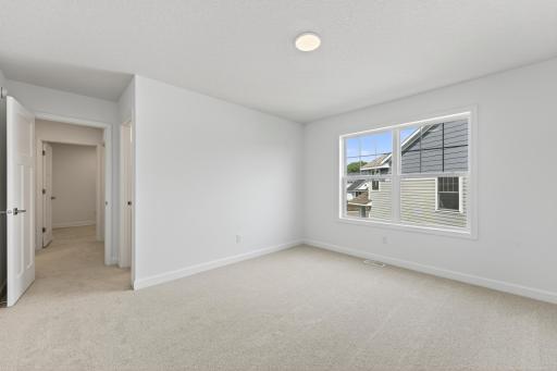 (Photo of a similar home, actual finishes may vary)
