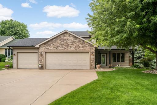 Beautiful Curb Appeal! Nicely updated Modified Two-Story with an attached 3-car Garage, beautifully landscaped yard, and a prime west-side Hastings location.