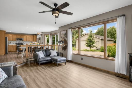Family Room Looking Toward Kitchen - Beautiful Backyard Views! Large windows fill the Family Room with natural light while overlooking the beautifully landscaped yard and detached heated garage.