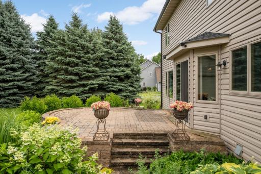 Paver Patio - Beautiful paver patio surrounded by mature landscaping - an ideal space for relaxing or entertaining outdoors.