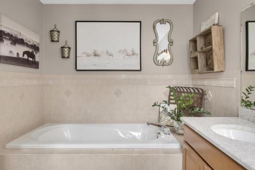 Relax in the large soaking tub within the private Owner's Bath.