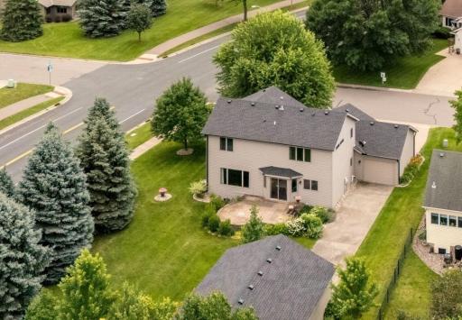 Excellent corner lot location with mature trees, beautiful landscaping, and convenient access to nearby amenities.