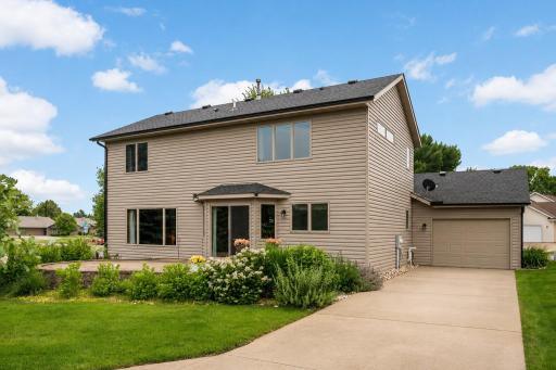 Drive-through access from the Main Garage leads to a second driveway and detached rear Garage, offering exceptional space for additional vehicles, hobbies, or storage.