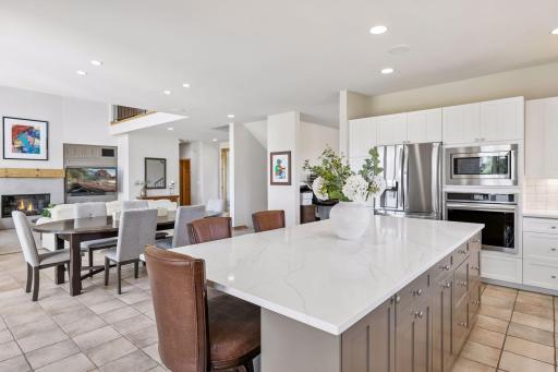 Spacious, quartz center island and stainless appliances