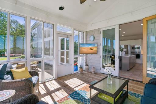 Escape to the three season porch to enjoy the views or catch the evening news.