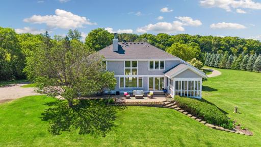 Enjoy the patio, rimmed with flowers and enjoy views of neighboring horses.