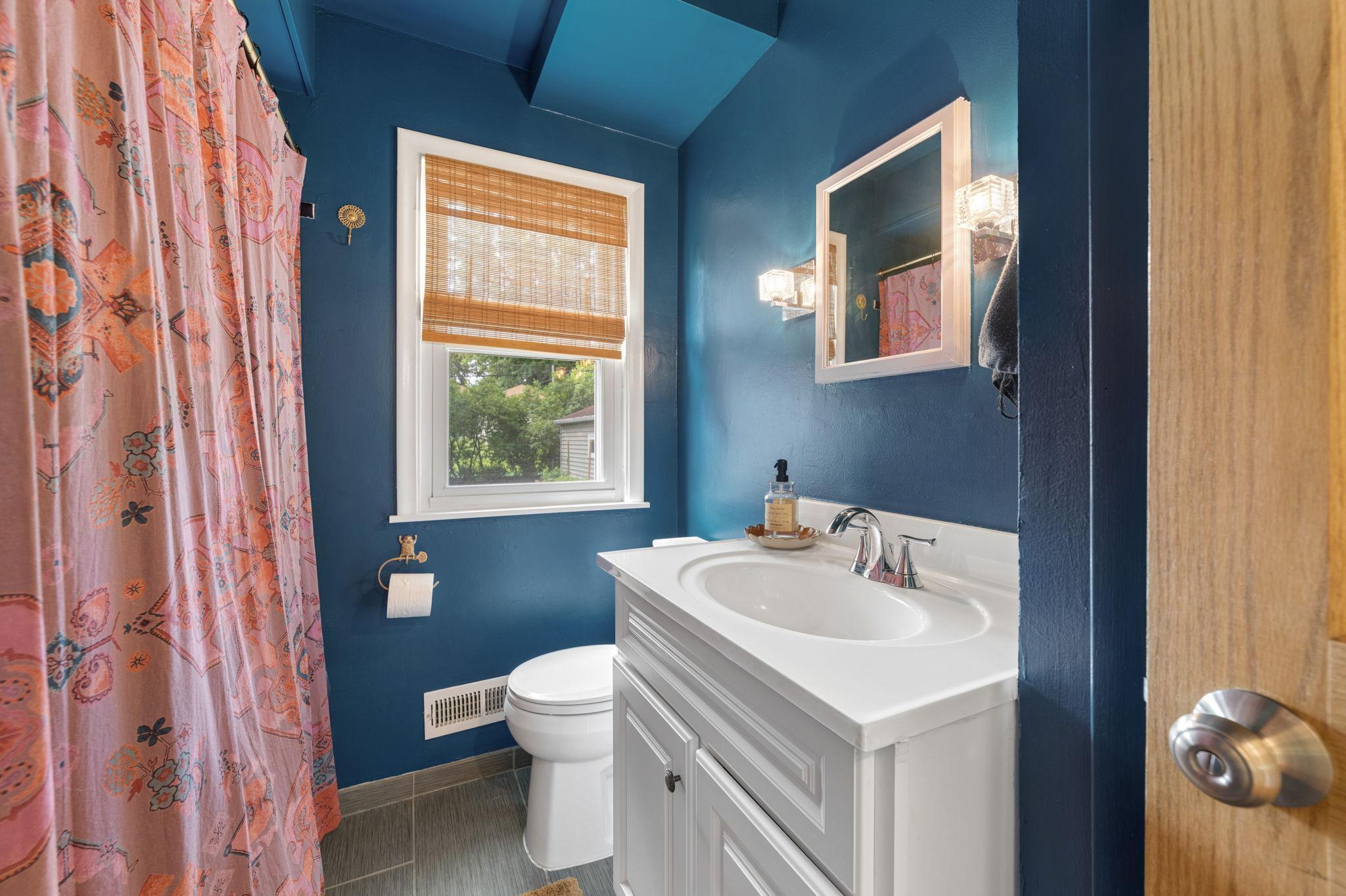 Color drenched main level full bathroom!