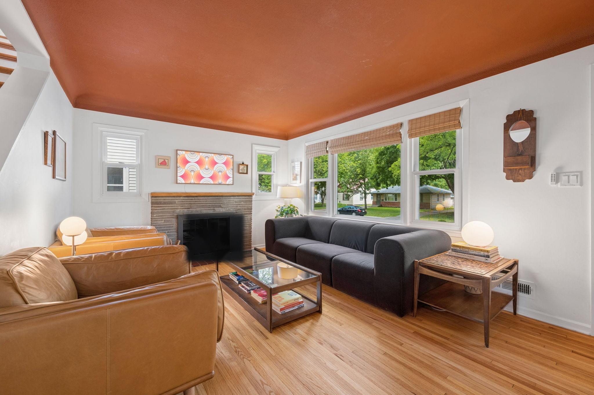 Beautiful hardwood floors throughout the main level create continuous flow from room to room.