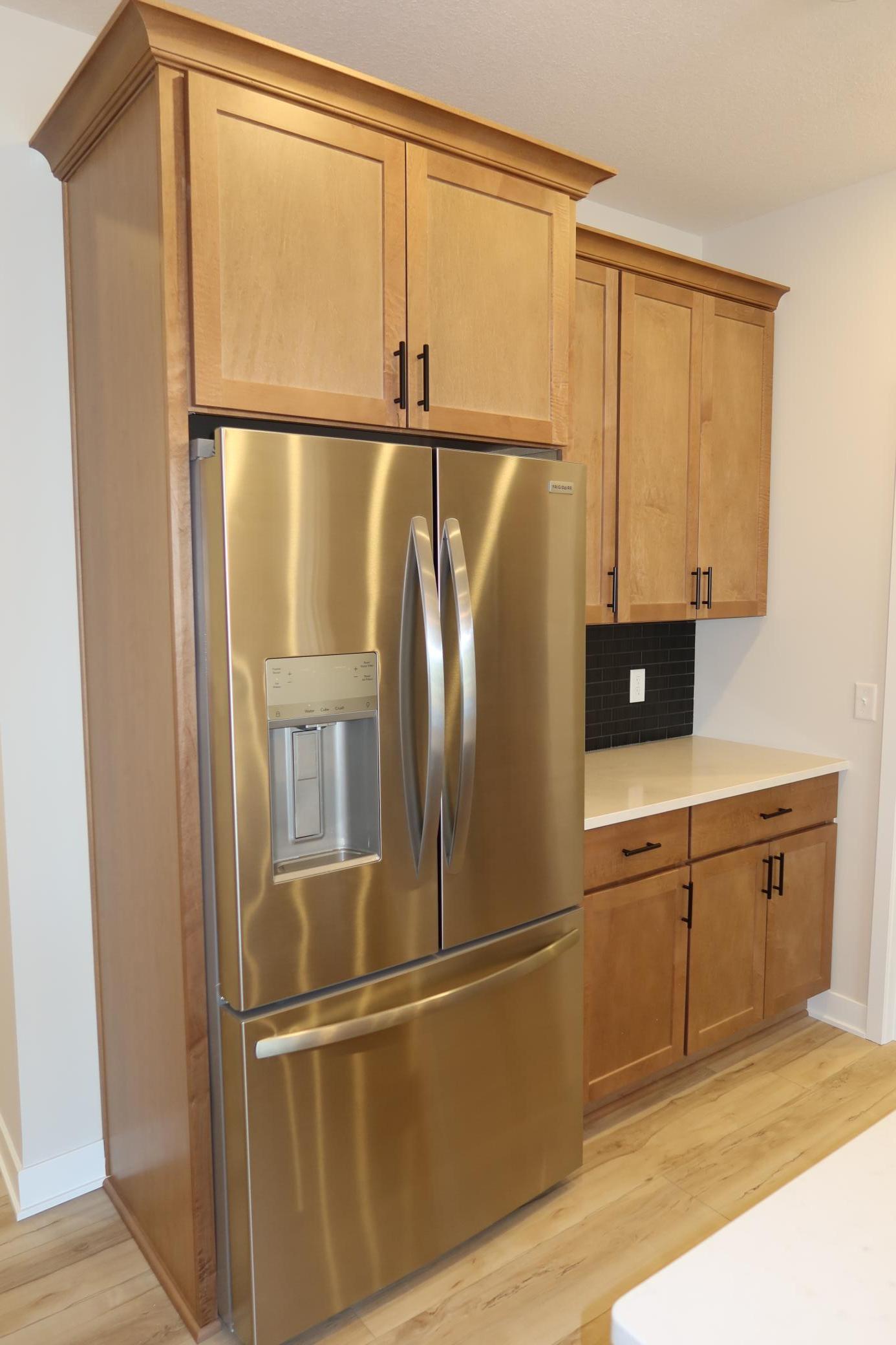 Kitchen Cabinetry and Fridge.JPG
