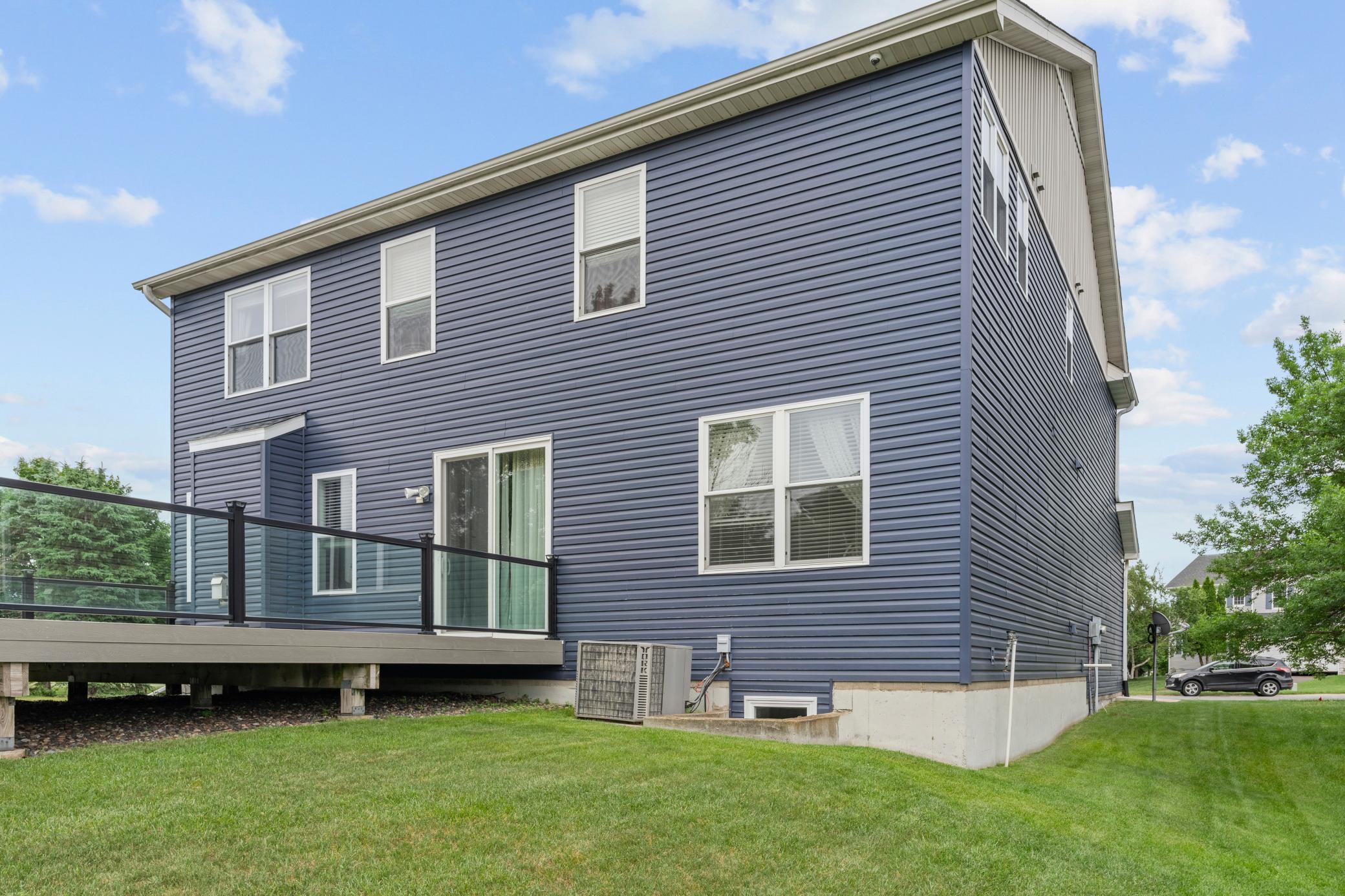 Spacious backyard with maintenance free deck.