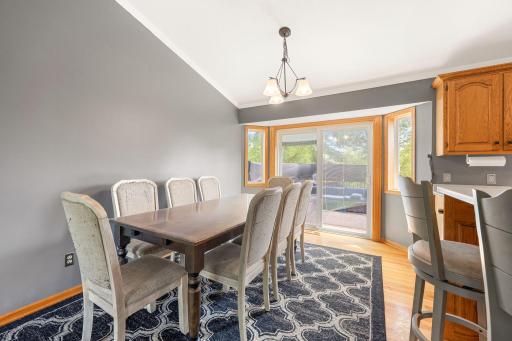 Large dining area with access to the deck is ideal for everyday life and entertaining!