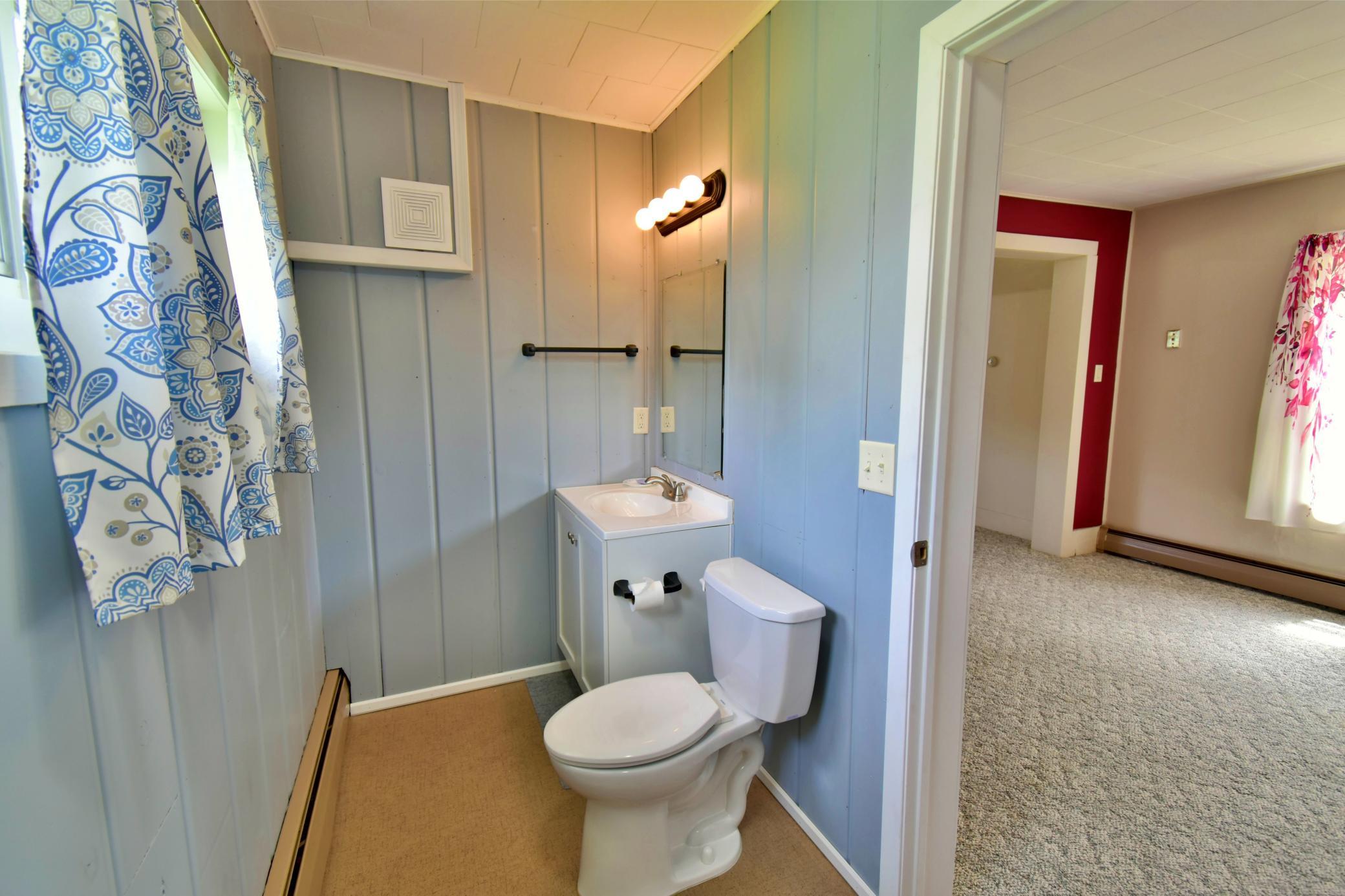 Half bathroom on the main level, recently updated, could easily be a 3/4 bath by adding a walk in shower where the closet is