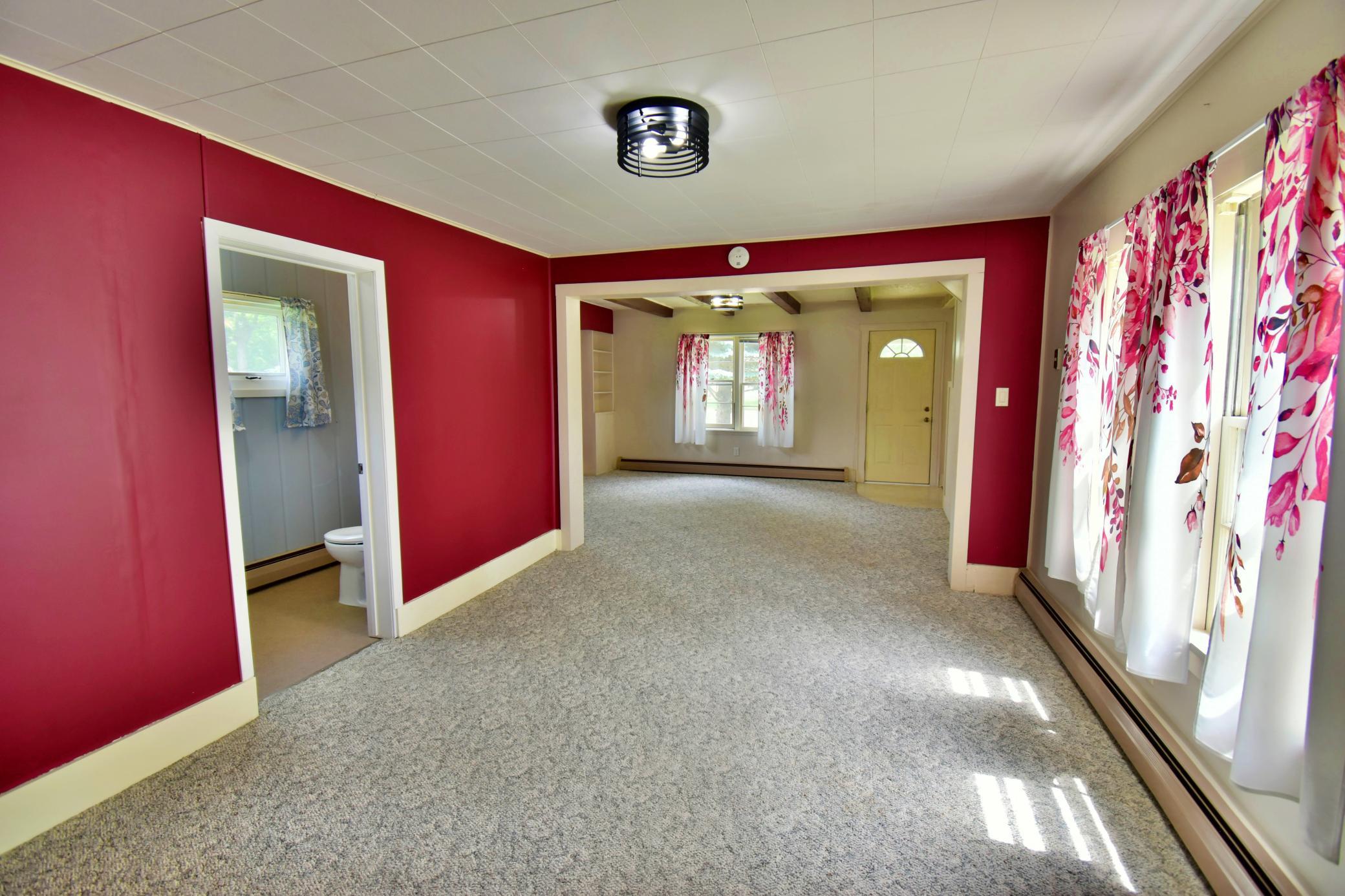 View of nthe dining area and living room from the kitchen, nice open areas great for entertaining or family get togethers!