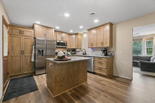 Fantastic updated kitchen with new cabinets, flooring and appliances