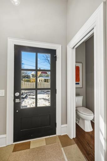Thoughtfully placed on the main level, this powder room offers convenience for guests or for that last fit check before heading out the door.