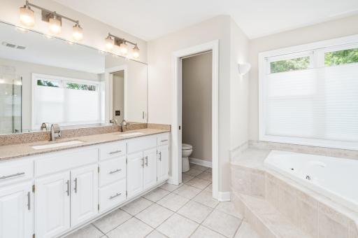 Primary Bath with whirlpool tub, separate shower & double vanity